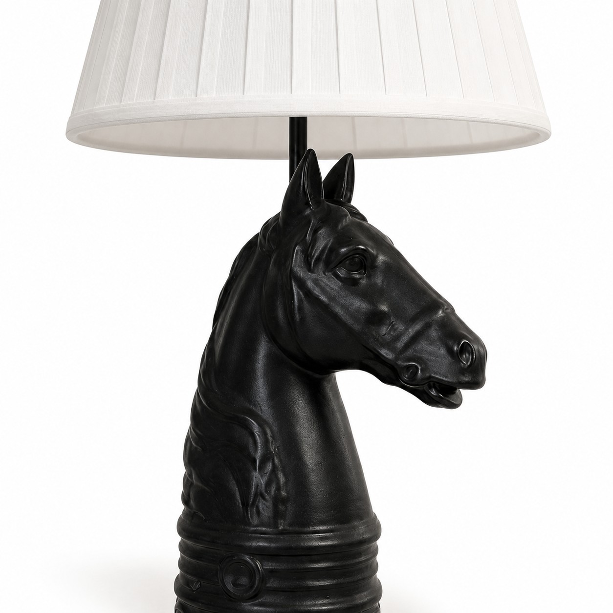 Close detail of black horse head table lamp base